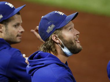 Los Angeles Dodgers starting pitcher Clayton Kershaw looks at a video replay during the first inning in Game One of the National League Division Series at Globe Life Field in Arlington, Texas, Tuesday, October 6, 2020. The Dodgers are facing the San Diego Padres. (Tom Fox/The Dallas Morning News) 