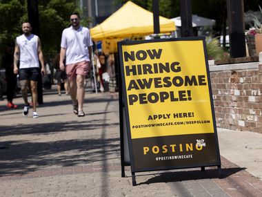 A now hiring sign outside of Position in Deep Ellum on Saturday, May 15, 2021, in Dallas.