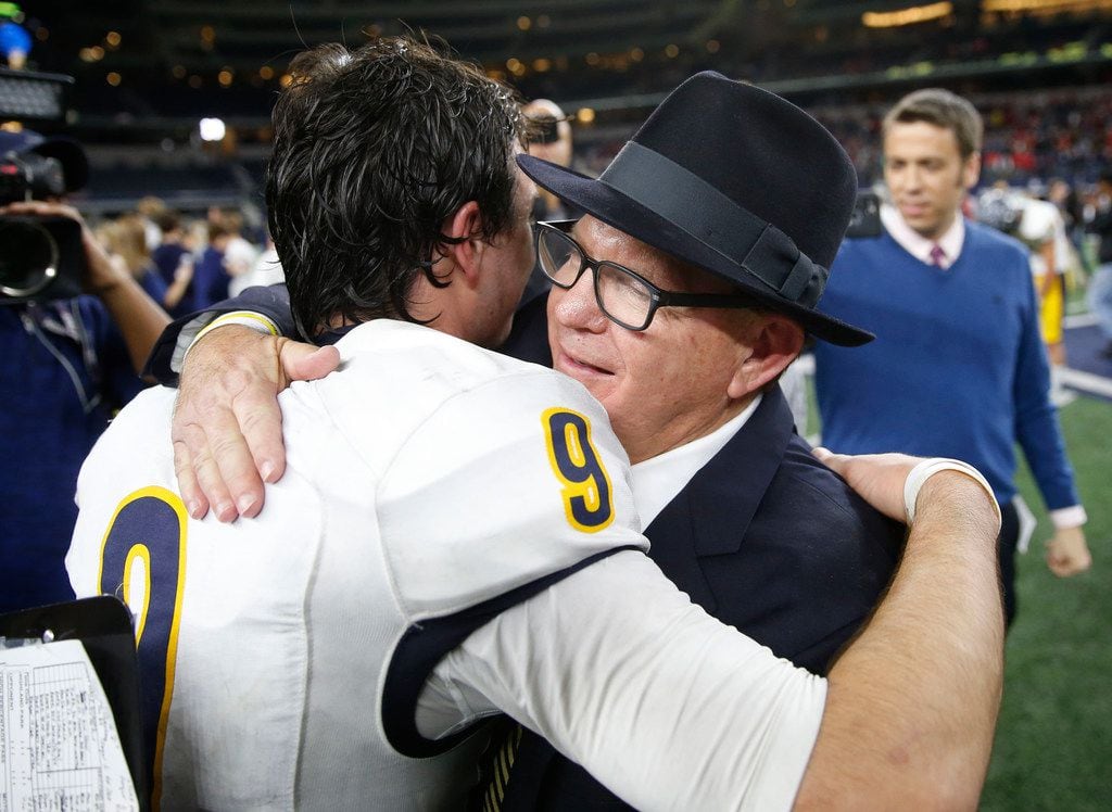 Highland Park's John Stephen Jones (9) hugs head coach Randy Allen after winning the UIL Class 5A Division II state football championship at AT&T Stadium in Arlington, Texas on Friday, December 22, 2017. Highland Park defeated Manvel 53-49. (Vernon Bryant/The Dallas Morning News)