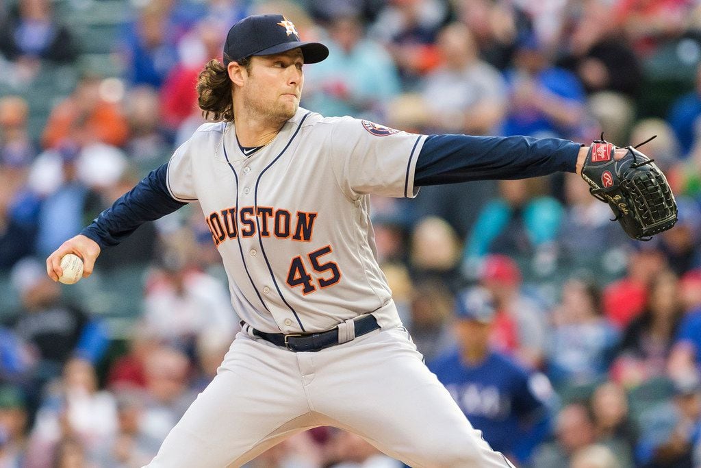 Houston Astros starting pitcher Gerrit Cole throws during the first inning against the Texas...