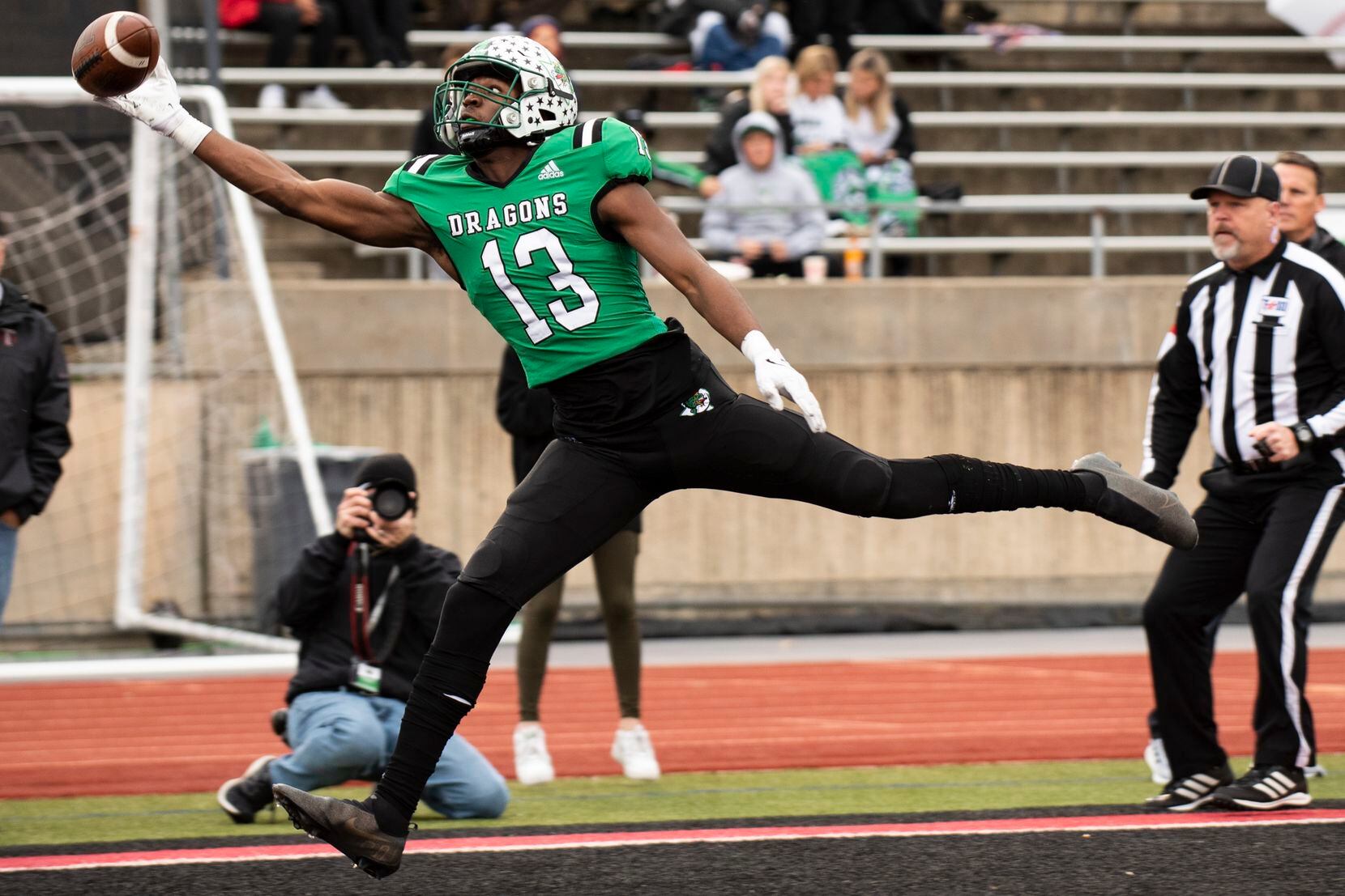 Southlake Carroll senior RJ Maryland (13) reaches for the ball during the Class 6A Division I Region I semifinal game between Southlake Carroll and Lewisville at Buddy Echols Field in Coppell, Texas on Saturday, November 27, 2021. (Emil Lippe/Special Contributor)