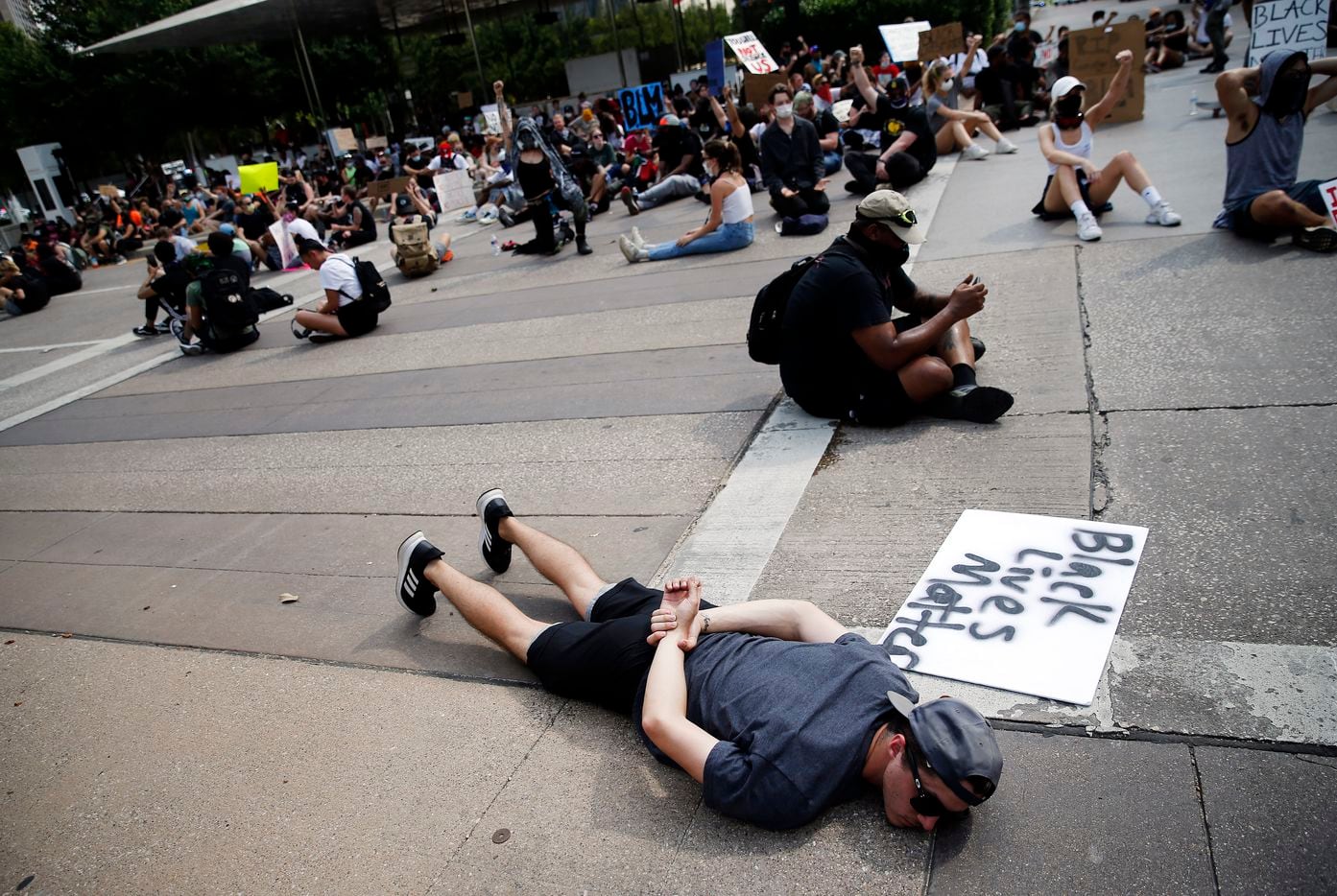 Protestors supporting Black Lives Matters block an intersection at Klyde Warren Park for 8 minutes and 46 seconds, the time it took for the in-custody death of George Floyd. The march wound through downtown Dallas, Tuesday, June 2, 2020.