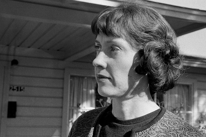 In this Dec. 5, 1963 file photo, Ruth Hyde Paine stands outside her home in Irving, Texas.