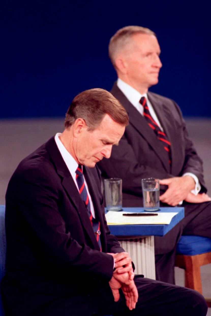 1992:  In an indelible moment from the annals of televised presidential debates, President...