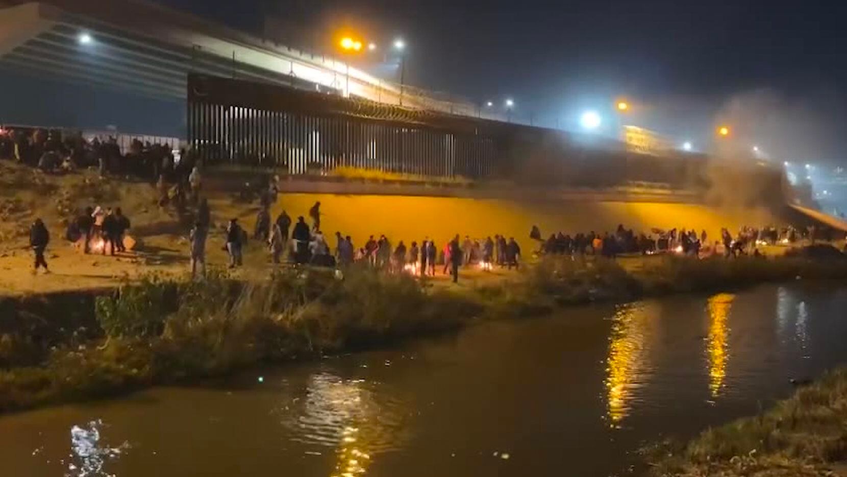 Migrants gathered in El Paso along the Rio Grande on Dec. 19, 2022. Biden’s humanitarian...