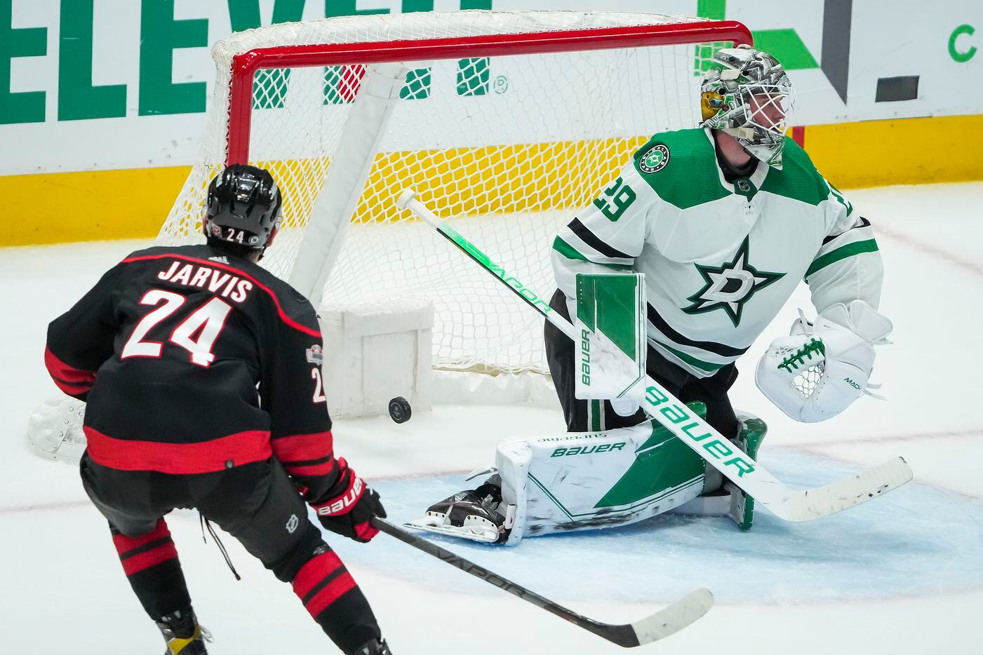 A game-winning shot from Carolina Hurricanes center Martin Necas goes wide of Dallas Stars...