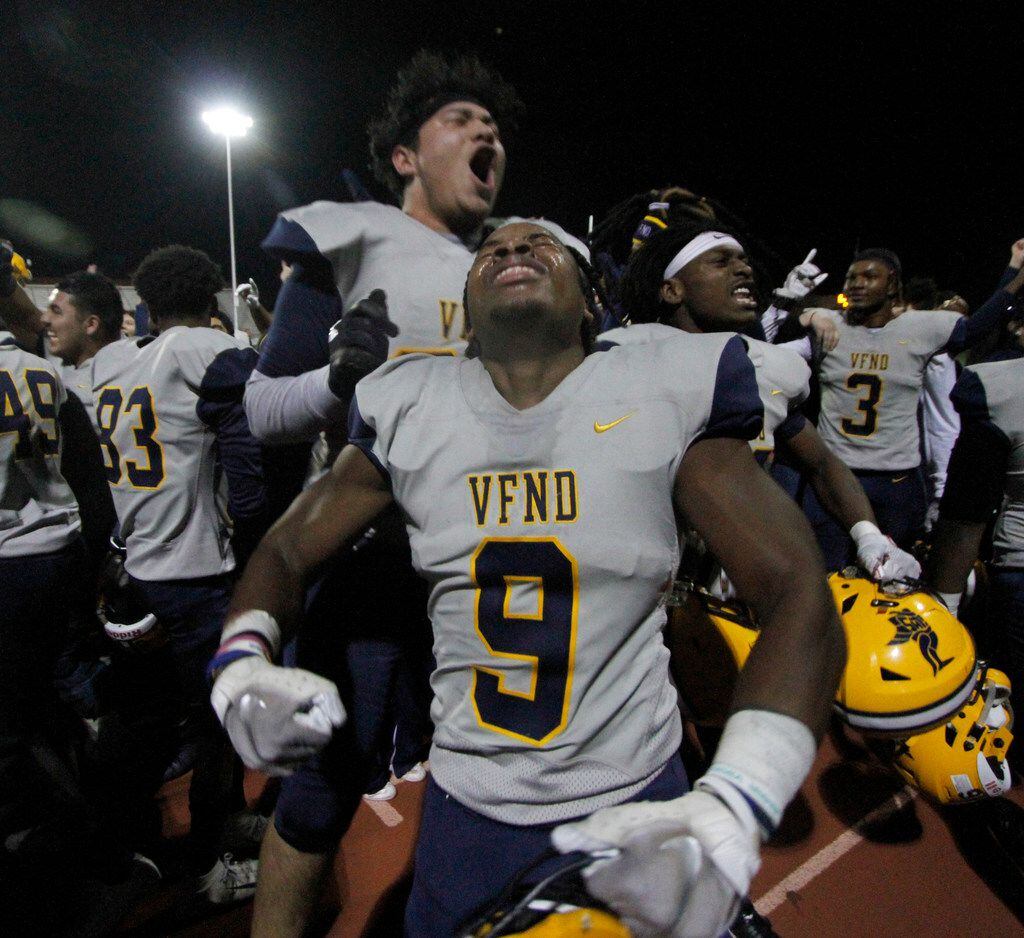 Arlington Lamar linebacker Jayveion Moore (9) revels in the moment as he celebrates with...