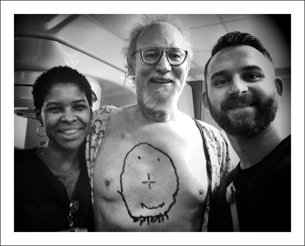 1/26/18 — Last of 15 radiology appointments today. I surprised Ramona and Rob, the super zapping duo, with a big smile. Courtney Perry suggested I draw a smiley face when she saw a previous post showing the alignment tattoos. The little dot in the center of the nose is permanent. The rest I did this morning. I know it's pretty bad because my great artist son wouldn't do it for me.