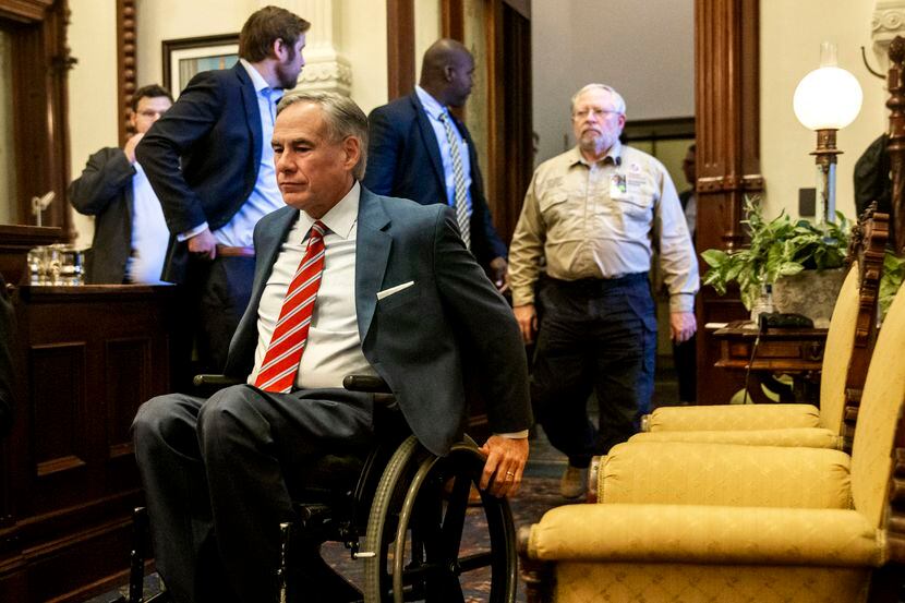 Gov. Greg Abbott, shown entering a May 18 press conference, was ridiculed -- both for his...