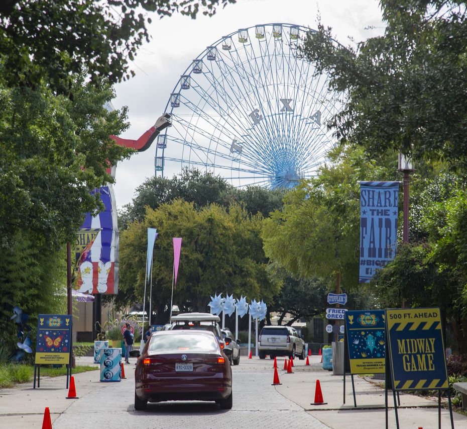 Drivers attend the Opening Day of the Big Tex Fair Food Drive-Thru at Fair Park in Dallas Friday, Sept. 25, 2020. (Juan Figueroa/ The Dallas Morning News)