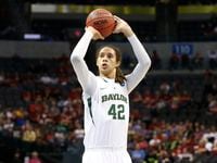 Baylor's Brittney Griner shoots a foul shot against Louisville in the second half of a...