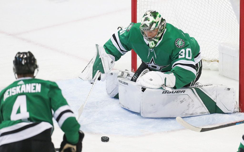 Dallas Stars goaltender Ben Bishop (30) blocks a shot on goal during the first period of a matchup between the Dallas Stars and the Buffalo Sabres on Wednesday, Jan. 30, 2019 at American Airlines Center in Dallas.