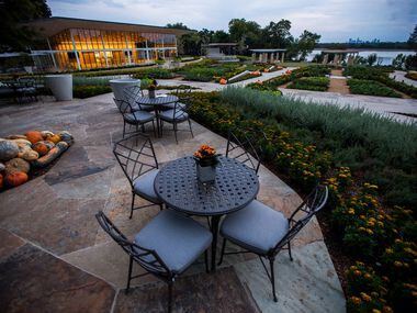 A seating area near the test kitchen building at the new Tasteful Place edible garden at the...
