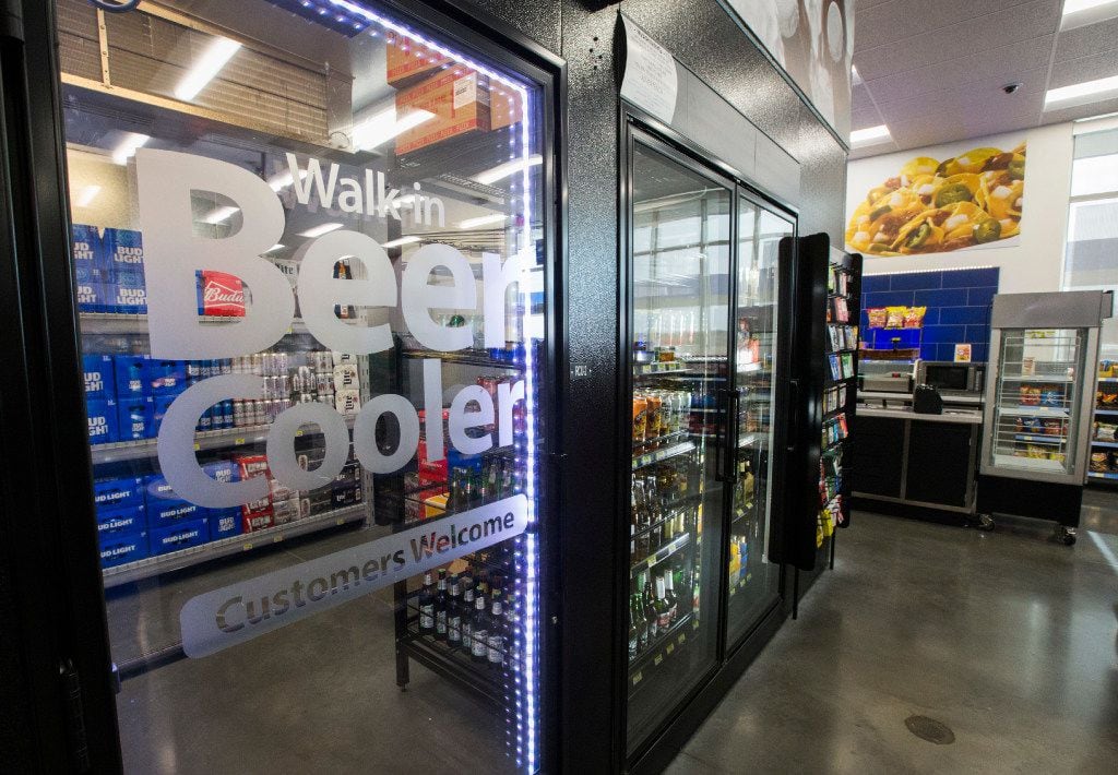 A walk-in beer cooler inside a new Walmart convenience store on Wednesday, February 8, 2017...