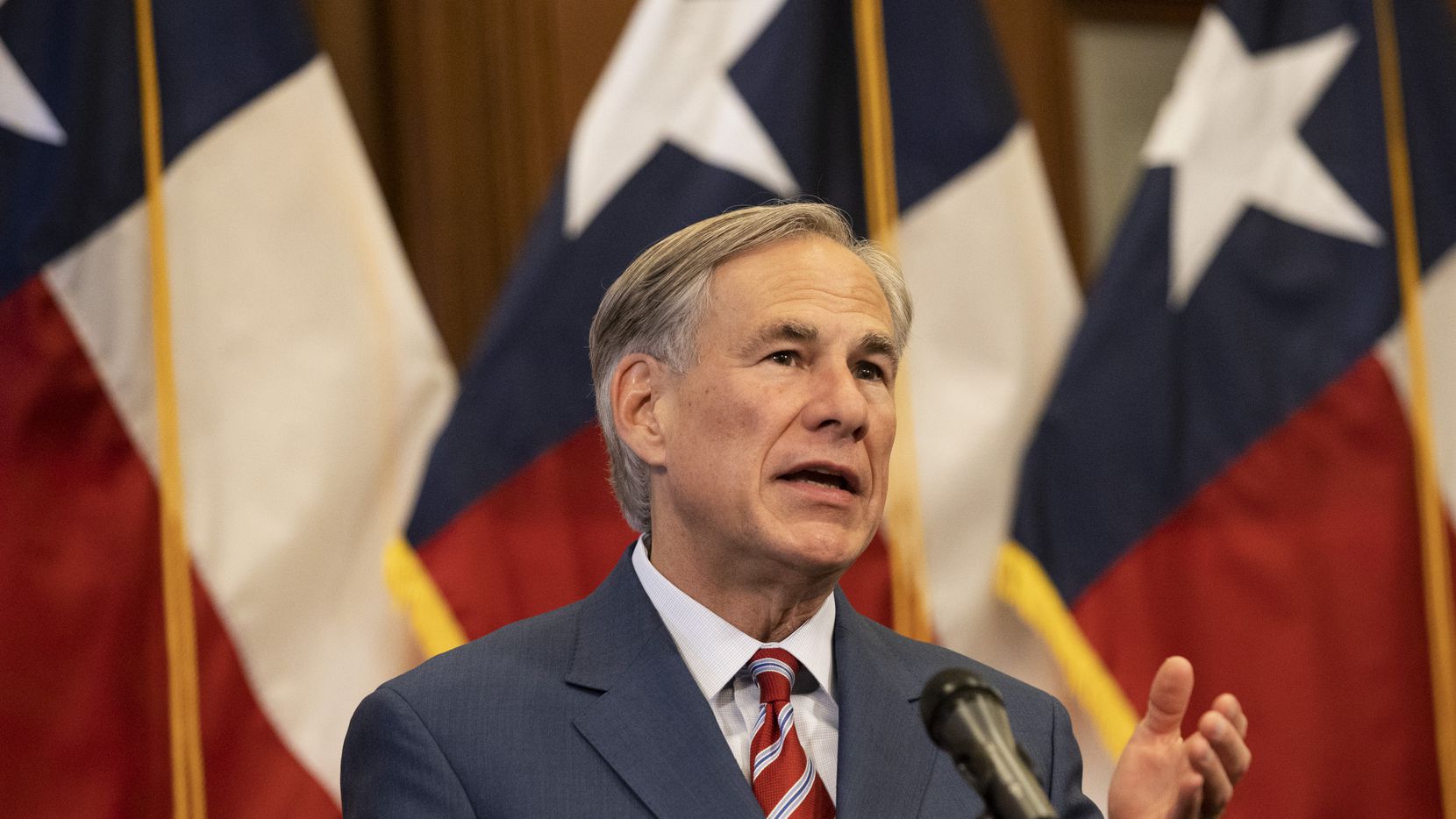 Texas Governor Greg Abbott announces the reopening of more Texas businesses during the COVID-19 pandemic at a press conference at the Texas State Capitol in Austin on Monday, May 18, 2020. Abbott said that childcare facilities, youth camps, some professional sports, and bars may now begin to fully or partially reopen their facilities as outlined by regulations listed on the Open Texas website.