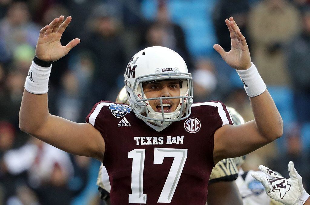CHARLOTTE, NC - DECEMBER 29:  Nick Starkel #17 of the Texas A&M Aggies reacts after a play...