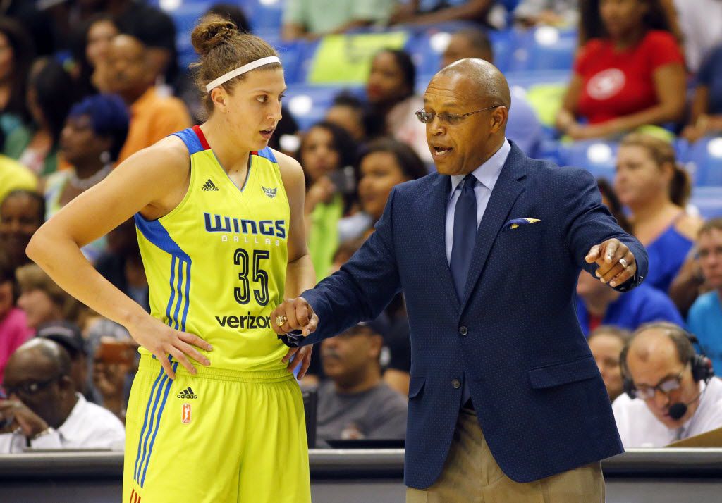 Dallas Wings head coach Fred Williams gives instruction to forward Jordan Hooper (35) in the...