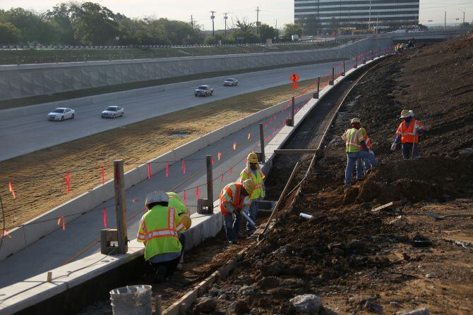 Construction workers along State Highway 161 in Grand Prairie in 2019. Brianne Glover of the...