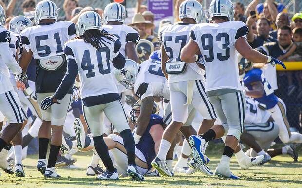 Cowboys and Rams players brawl during Tuesday's practice.