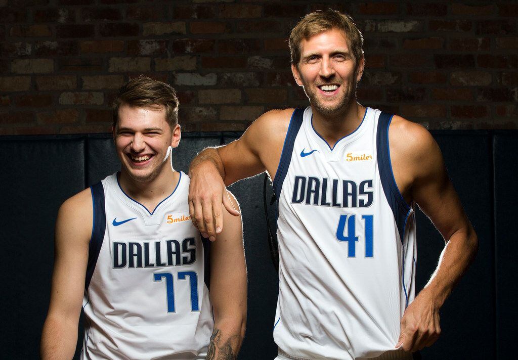 Dallas Mavericks Luka Doncic (left) and Dirk Nowitzki poses for a photo during Dallas Mavericks Media Day at the American Airlines Center in Dallas, Friday, September  21, 2018.