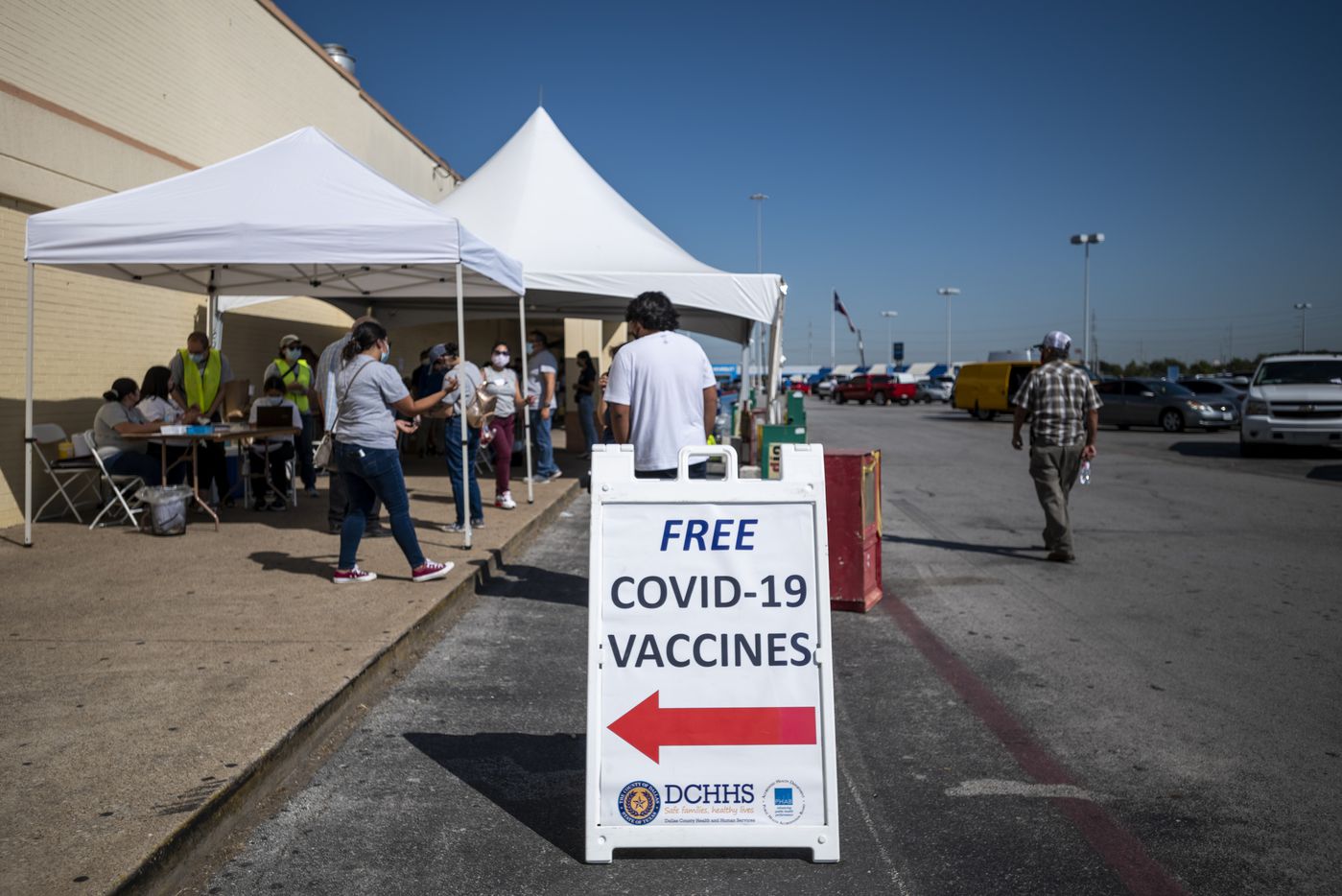 Signs for a pop-up COVID-19 vaccine clinic operated by Dallas County Health and Human...