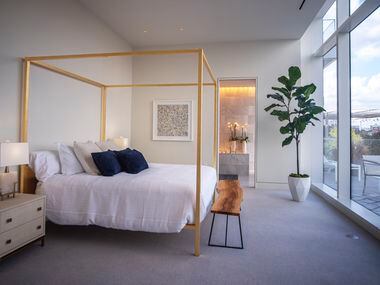 A master bedroom inside a model condo at the Hall Arts Residences.