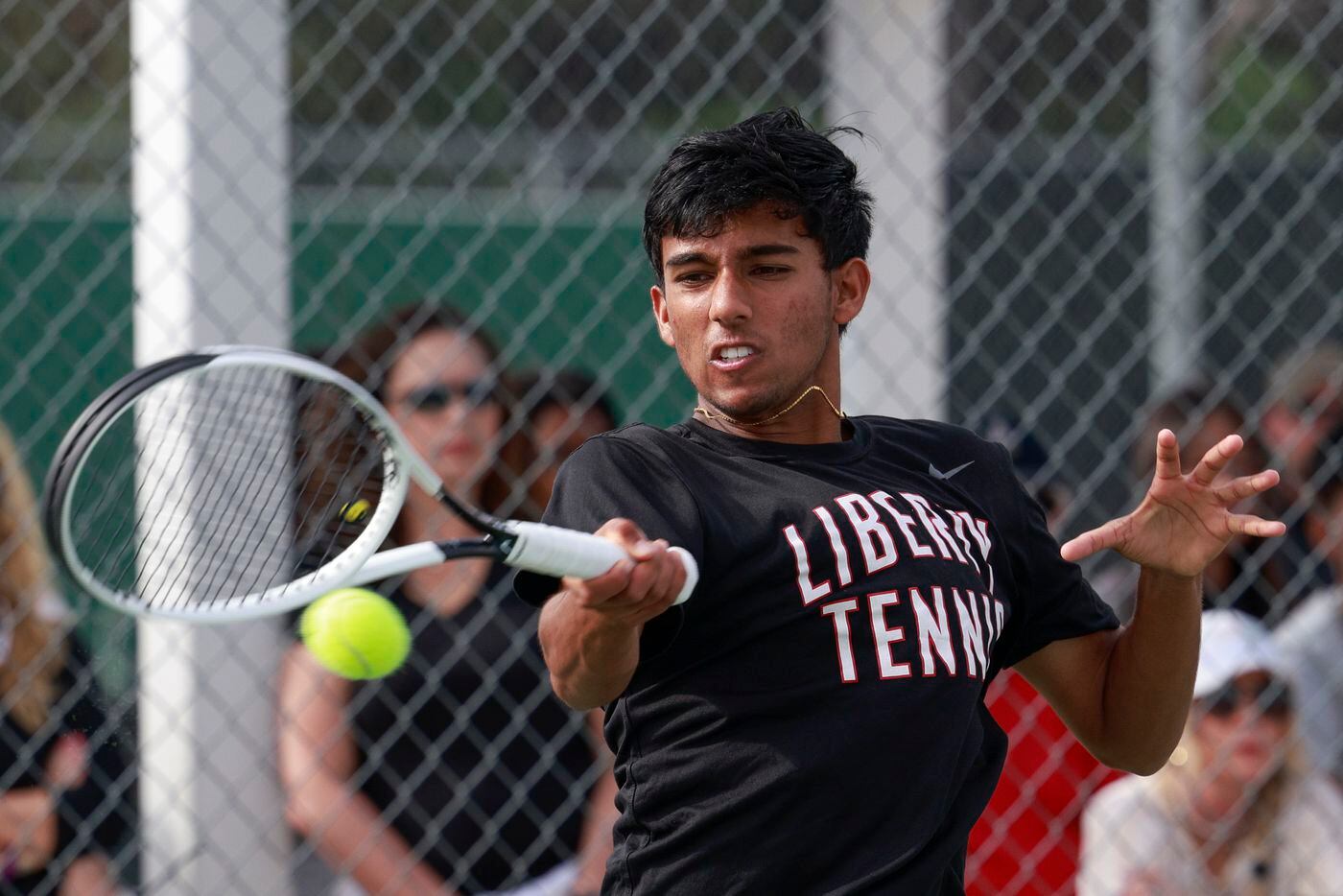 Frisco Liberty’s Sanjheev Rao hits a forehand shot during the 5A mixed doubles championship...