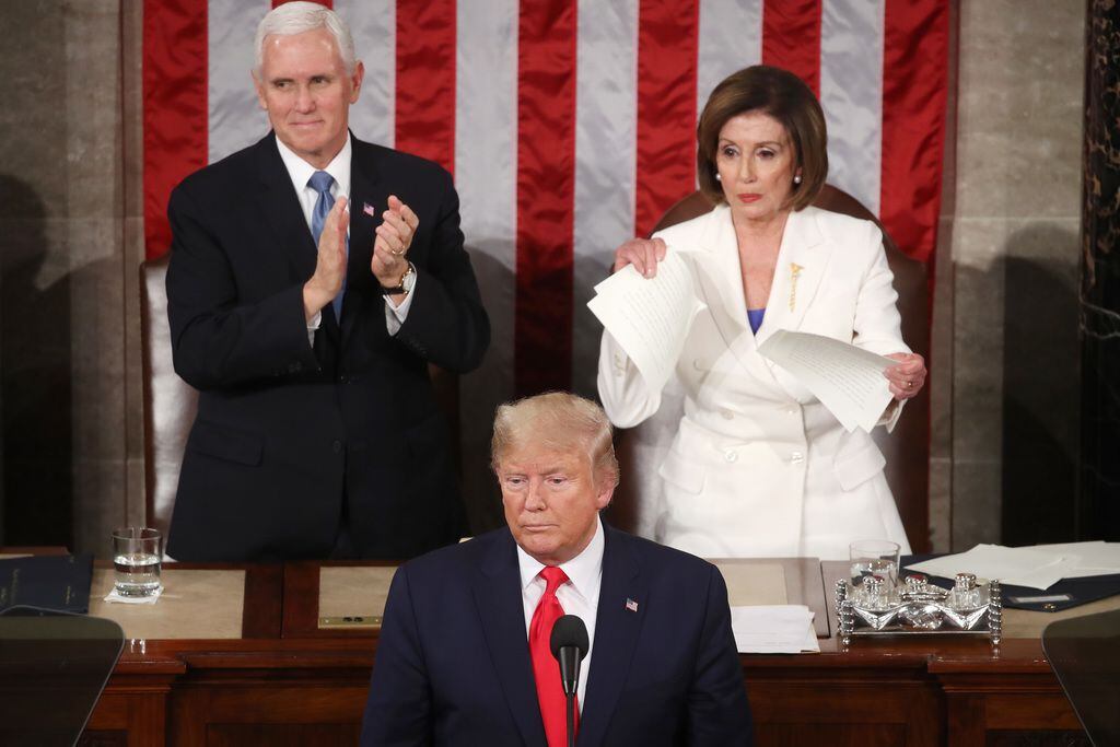 House Speaker Nancy Pelosi rips up pages of the State of the Union speech after President Donald Trump finishes delivering it Feb. 4, 2020.