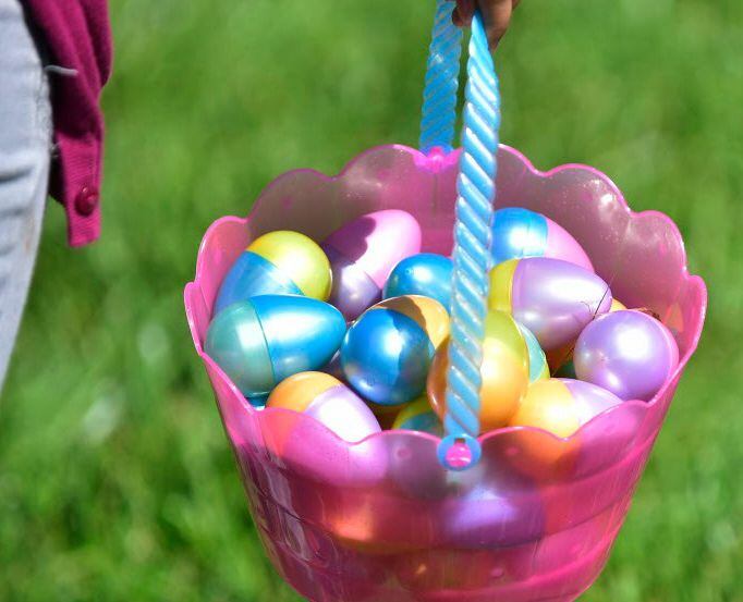 A basket full of easter eggs and candy at the Easter Eggstravaganza in Quakertown Park in...