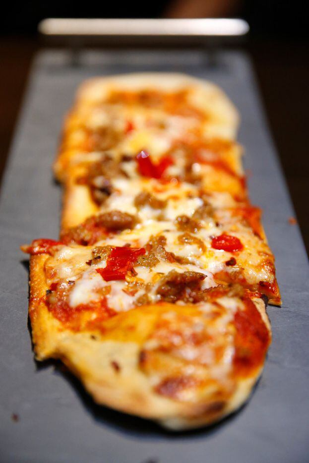 The Roma flatbread is served as an appetizer at the new Stadium Club restaurant in AT&T...