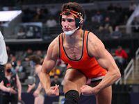 FILE — AJ Ferrari of Oklahoma State celebrates after beating Nino Bonaccorsi in the 197lb weight class in the first-place match during the NCAA Division I Men's Wrestling Championship at the Enterprise Center on March 20, 2021 in St Louis, Missouri.