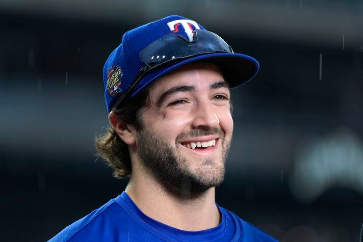 Texas Rangers' Josh Smith smiles after a baseball game against the Detroit Tigers,...