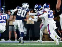 Dallas Cowboys running back Tony Pollard (20) broke away for a big second quarter run as...