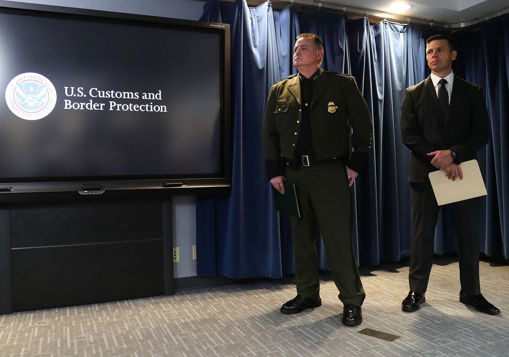 Brian Hastings,  chief of operations for the border patrol, left, and U.S. Customs and Border Protection Commissioner Kevin McAleenan prepare to
brief the media on migration statistics on Tuesday in Washington, D.C. McAleenan also discussed new medical procedures and plans for a new central processing center in El Paso.