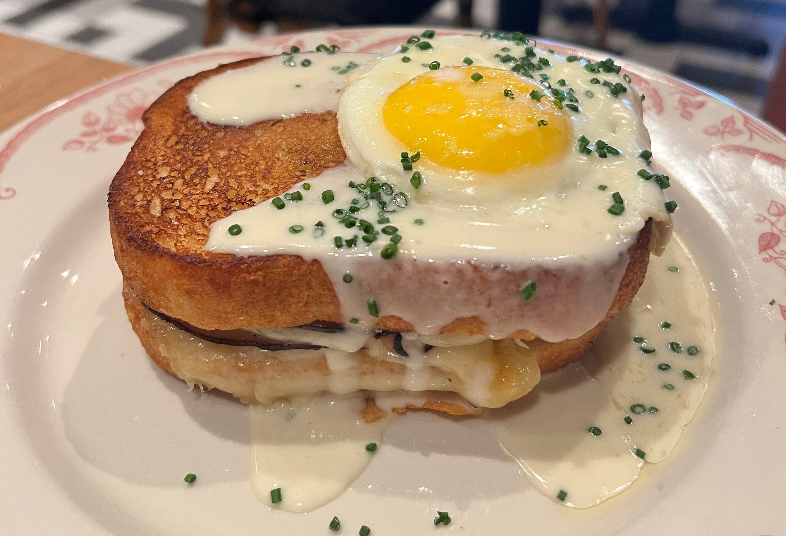 Le Margot's Croque Madame is a $16 lunchtime sandwich with prosciutto and gruyere, an egg on...