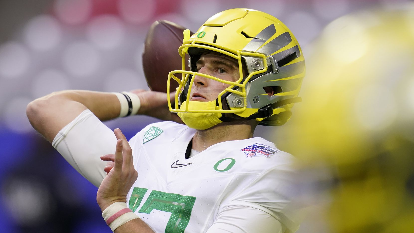 Oregon quarterback Tyler Shough (12) warms up prior to the Fiesta Bowl NCAA college football...