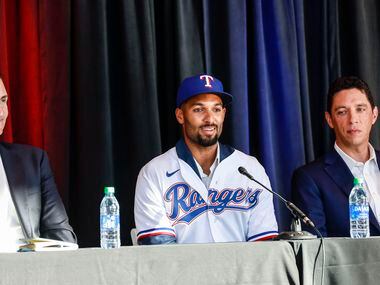 Marcus Semien speaks at a news conference at Globe Life Park in Arlington on Wednesday, Dec....