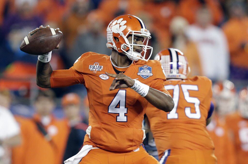 FILE - In this Dec. 5, 2015 file photo, Clemson quarterback Deshaun Watson looks to pass against North Carolina during the first half of the Atlantic Coast Conference championship NCAA college football game in Charlotte, N.C. Watson is the face of No. 1 Clemson’s high-powered offense.  (AP Photo/Gerry Broome, File)