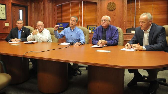 
Rep. Mac Thornberry (center) updated officials on developments with the government this...