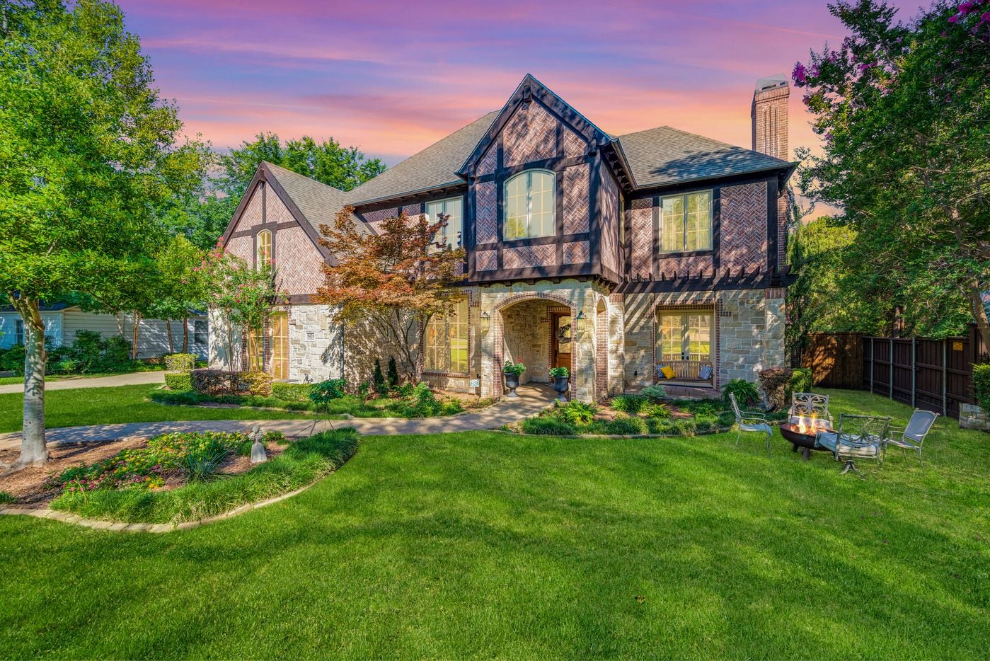 The traditional-style home is set on an oversized lot in the heart of Forest Hills.