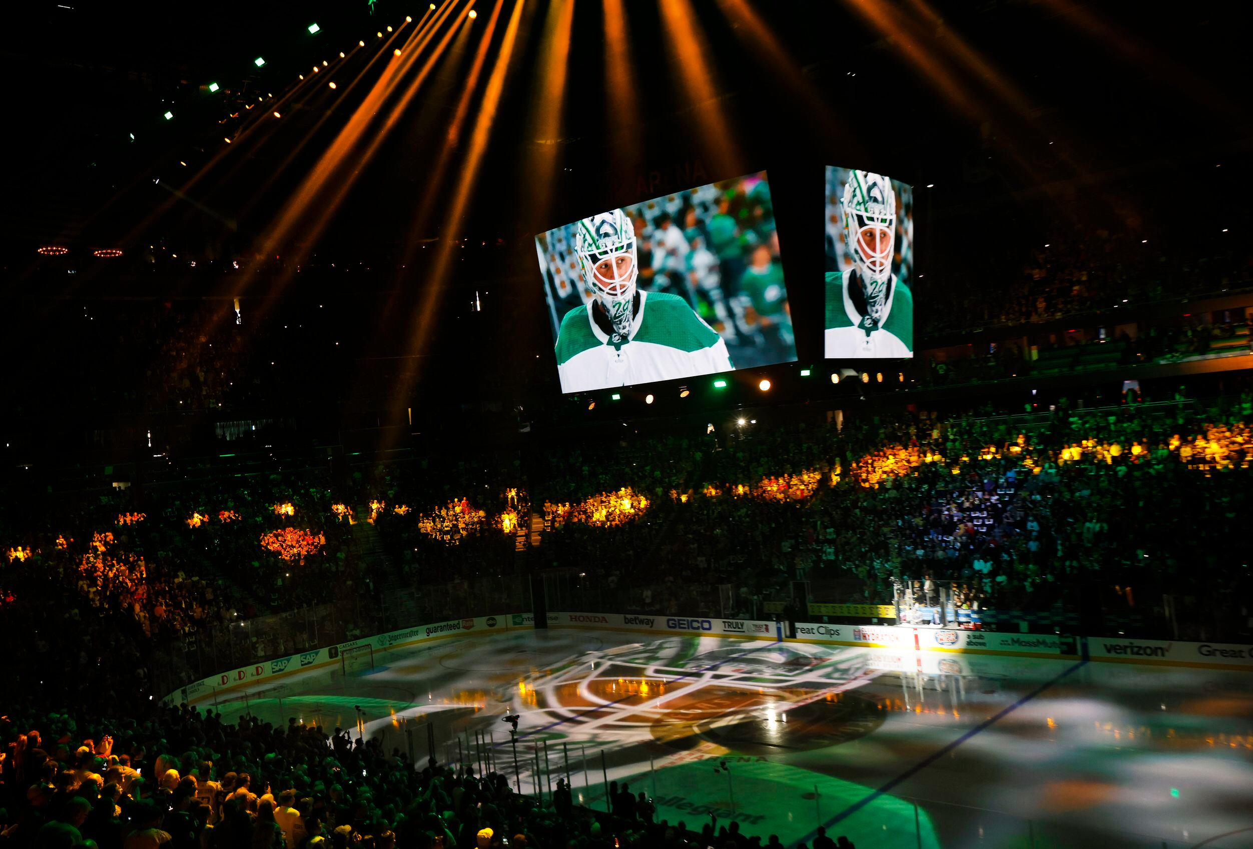 Dallas Stars goaltender Jake Oettinger (29) is projected on the ice during a pregame...