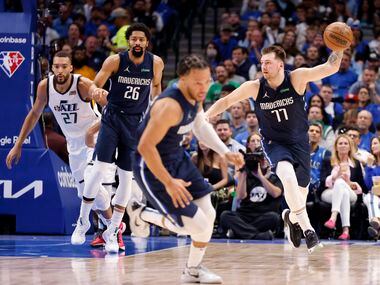 Dallas Mavericks guard Luka Doncic (77) brings the ball up court after a missed Utah Jazz...