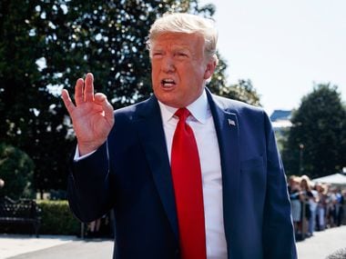 President Donald Trump talked to reporters on the South Lawn of the White House, Friday, Aug. 9, 2019, in Washington, as he prepared to leave Washington for his annual August holiday at his New Jersey golf club.