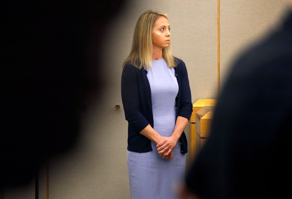 Amber Guyger prepares to take the witness stand during her murder trial for killing Botham...