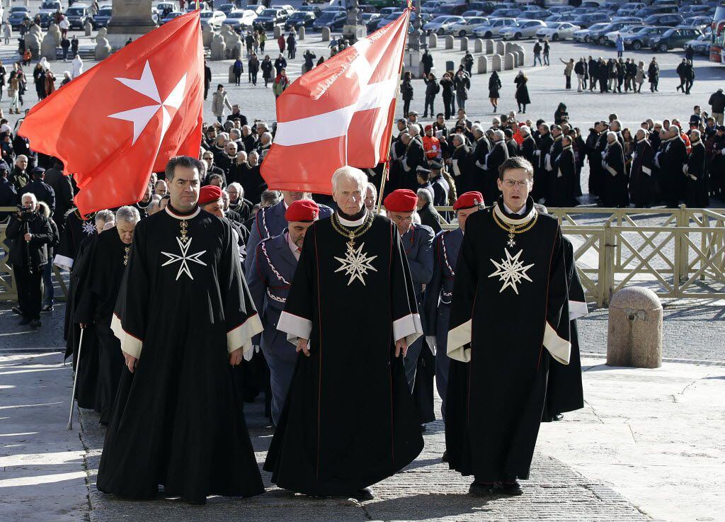Members of the Knights of Malta walk in procession towards St. Peter's Basilica during a...