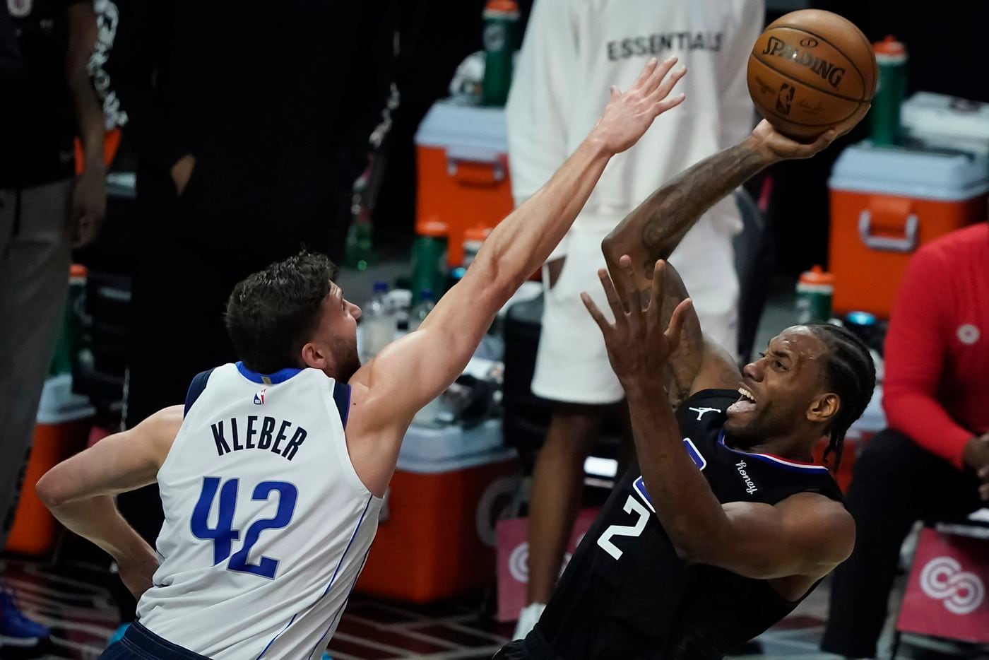 LA Clippers forward Kawhi Leonard (2) shoots over Dallas Mavericks forward Maxi Kleber (42) during the first half of an NBA playoff basketball game at Staples Center on Tuesday, May 25, 2021, in Los Angeles.