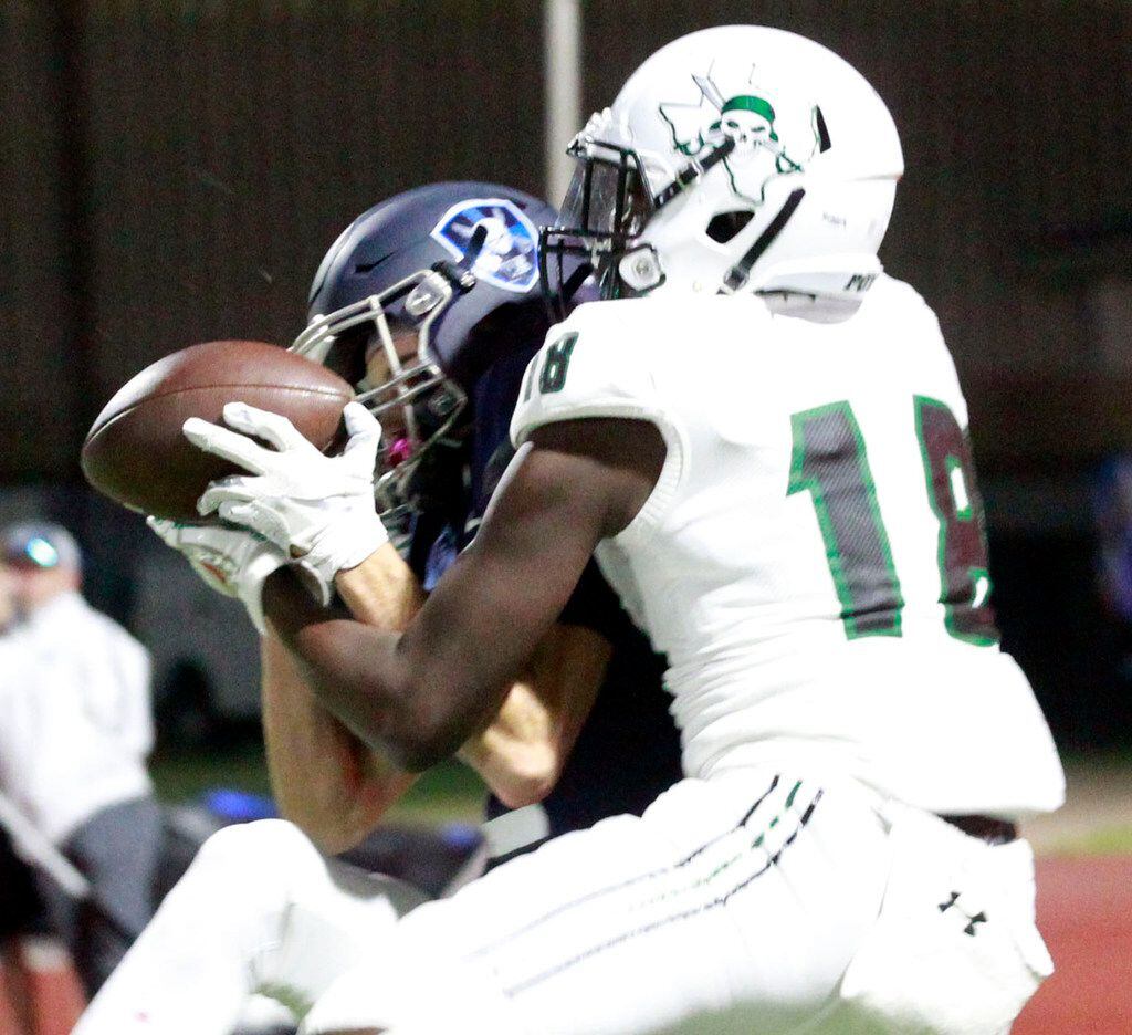 Mesquite Poteet's Gunner Stone (18) grabs a touchdown pass from the hands of Wylie East...