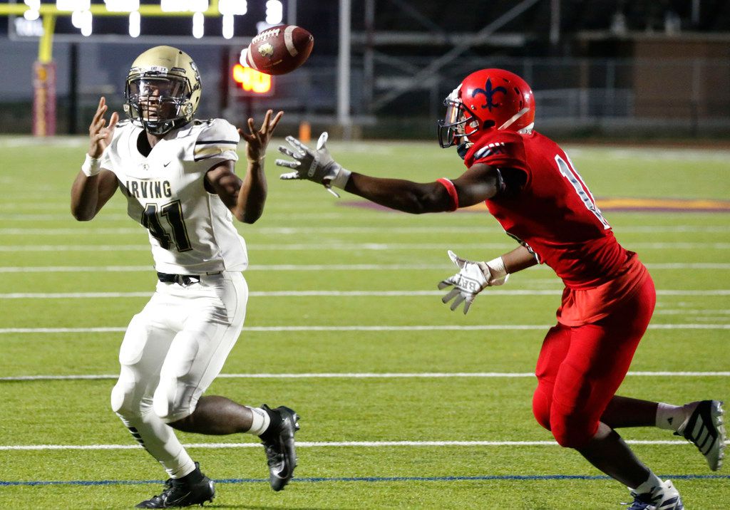 Irving High RB Chason Banks (41) gathers in a touchdown pass during the first half of their high school football game against Kimball high at Sprague Stadium in Dallas on Friday, September 13, 2019. (John F. Rhodes / Special Contributor)