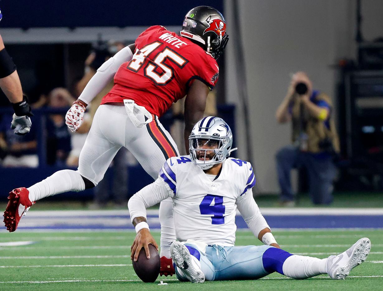 Dallas Cowboys quarterback Dak Prescott (4) reacts after being sacked by Tampa Bay...