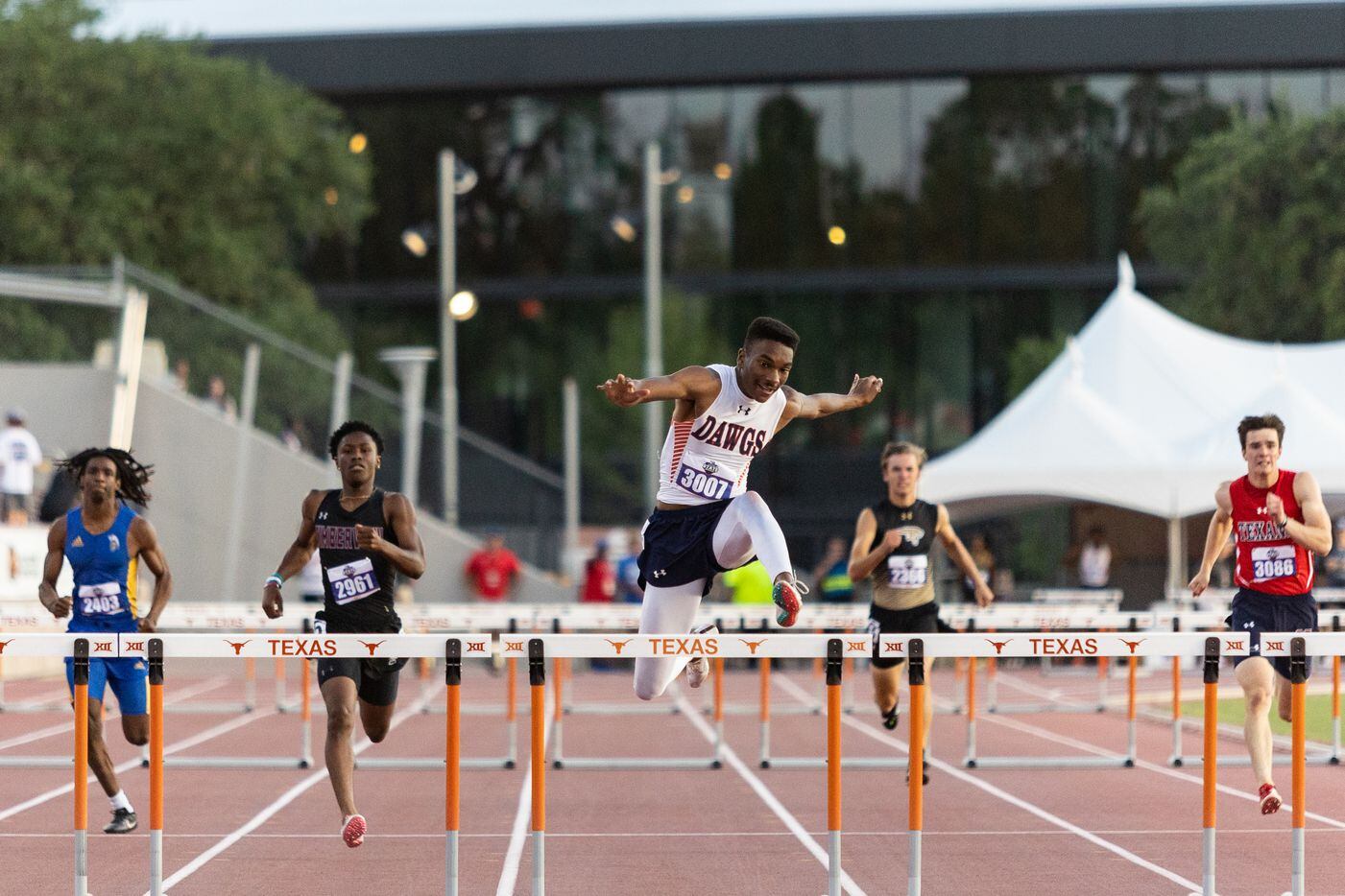 Kody Blackwood of McKinney North competes in the boys’ 300m hurdles final at the UIL Track &...